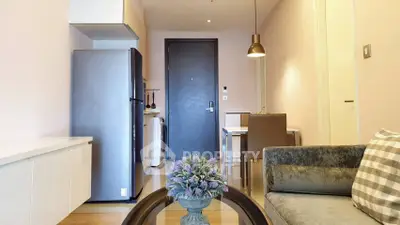 Modern apartment interior with sleek kitchen and cozy living area