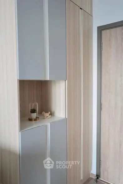 Modern storage cabinet with sleek design and wooden finish