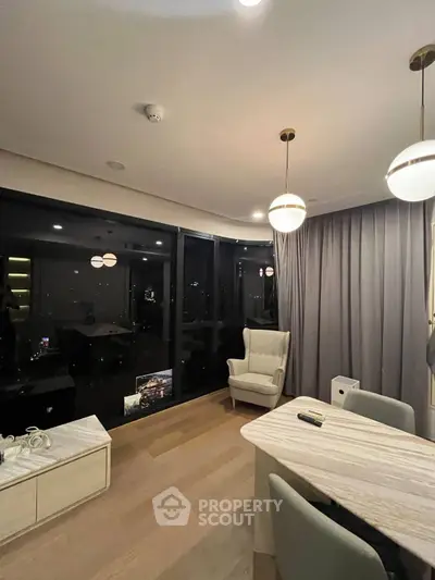 Modern living room with elegant lighting and city view