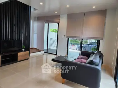 Modern living room with sleek design and natural light