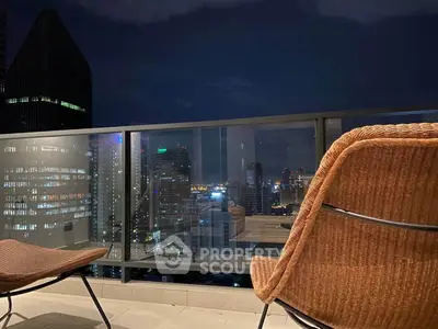 Stunning cityscape view from a modern balcony at night, perfect for urban living.