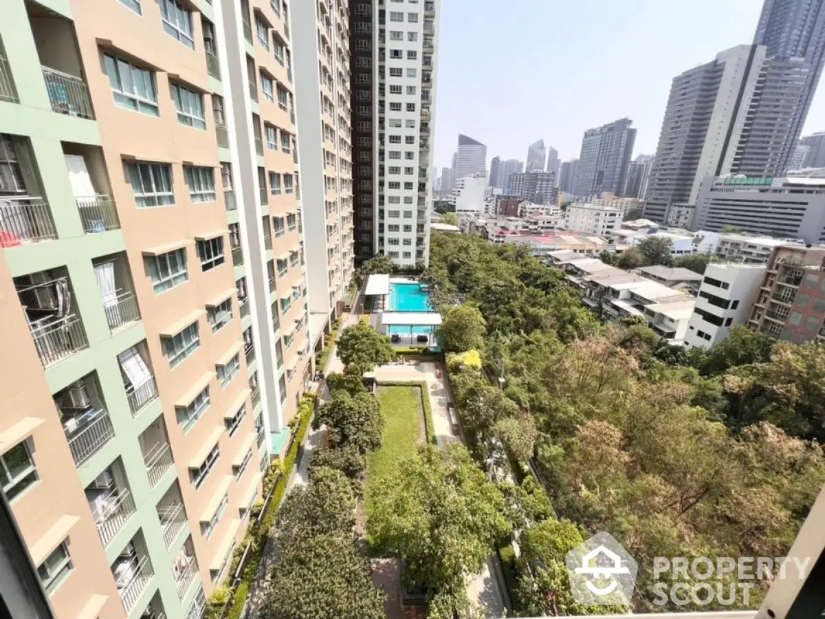 High-rise residential building with lush garden and pool view in urban setting