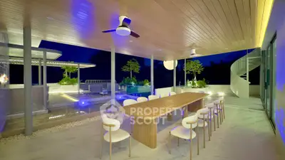 Luxurious outdoor dining area with modern design and ambient lighting