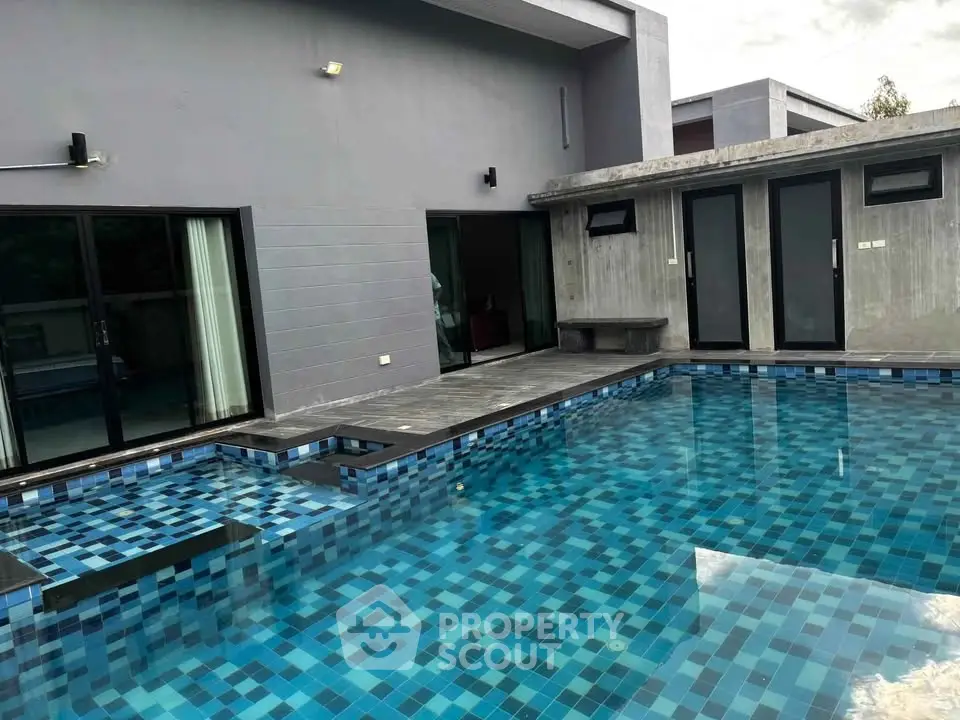 Luxurious modern home with stunning private pool and sleek architectural design.
