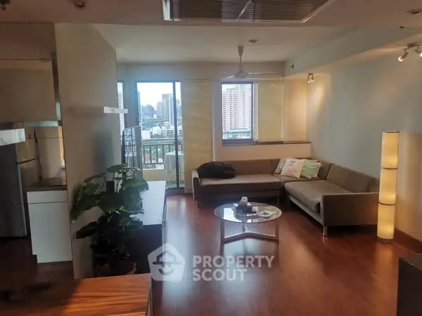 Spacious living room with city view and modern decor