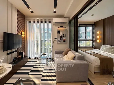 Modern living room with stylish decor and natural light in a contemporary apartment