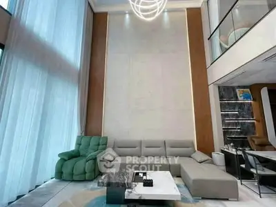Luxurious modern living room with high ceilings and elegant furniture