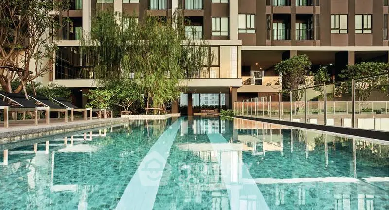 Luxurious condominium with stunning pool and modern architecture