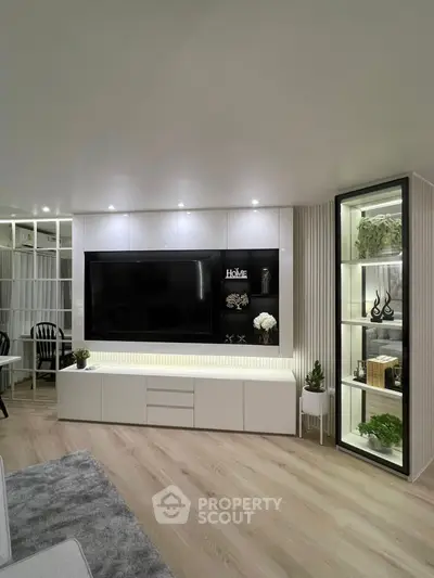 Modern living room with sleek TV unit and stylish decor