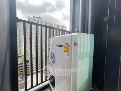 Modern apartment balcony with washing machine and city view