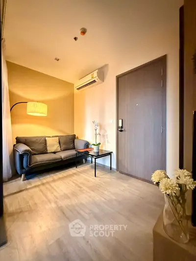 Cozy living room with modern decor and warm lighting