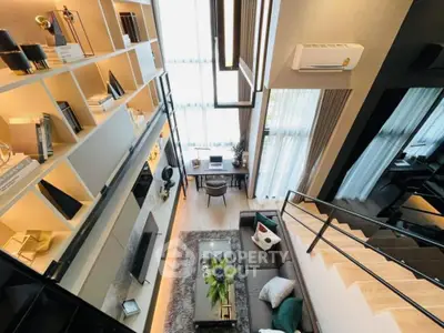 Modern loft-style living room with high ceilings and stylish decor