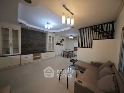Spacious modern living room with elegant lighting and open layout