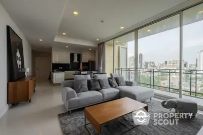 Spacious modern living room with city view and stylish decor