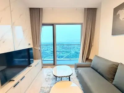 Modern living room with stunning city view and elegant decor