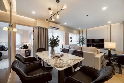 Luxurious modern living room with elegant dining area and stylish lighting