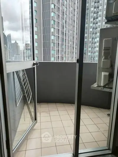 Modern urban balcony with cityscape view in high-rise building