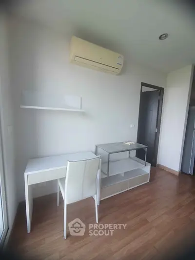 Modern study room with sleek furniture and air conditioning