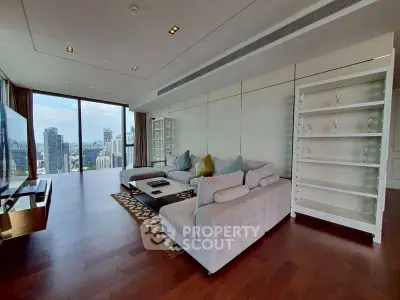 Luxurious living room with panoramic city views and modern furnishings