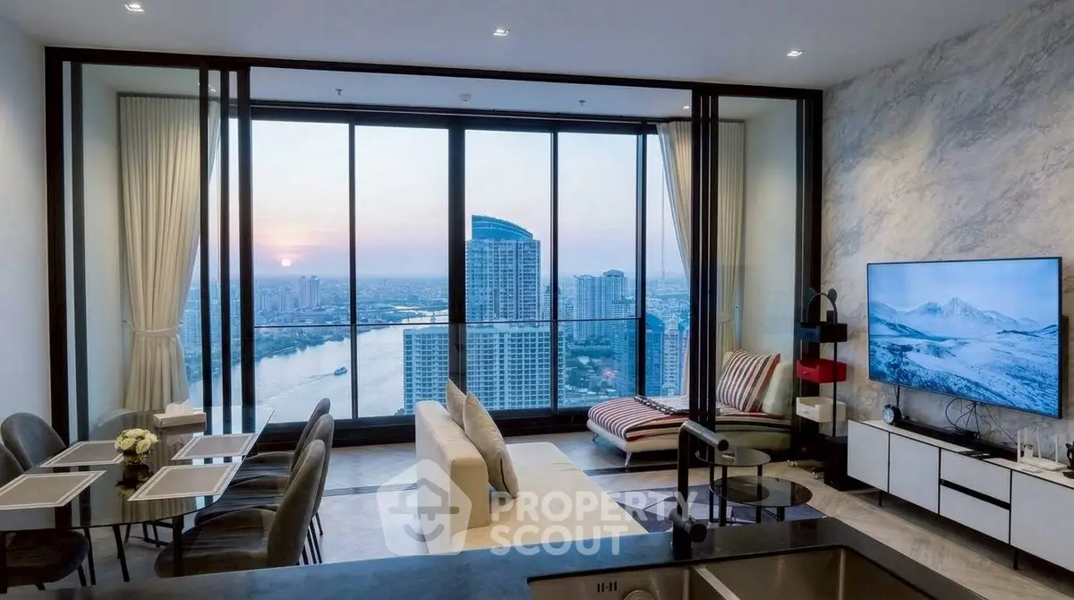 Luxurious living room with stunning city and river view, modern decor, and floor-to-ceiling windows.
