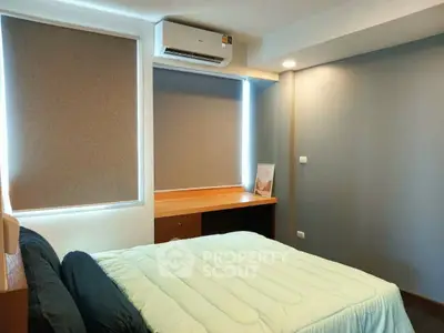 Cozy bedroom with modern decor and natural light