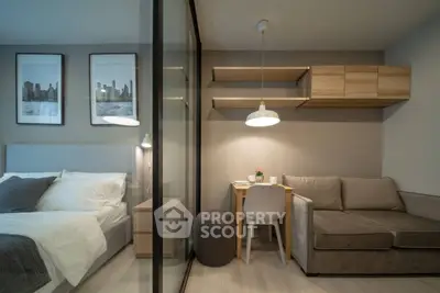 Modern studio apartment with cozy bedroom and stylish living area