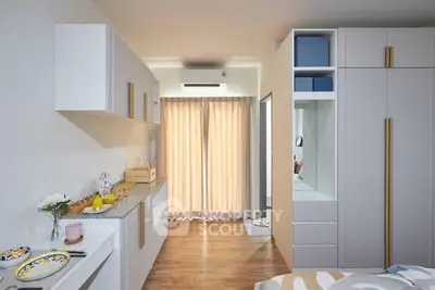 Modern bedroom with stylish storage and natural light