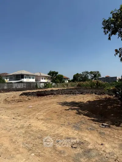 Spacious vacant land with potential for development in a serene residential area.