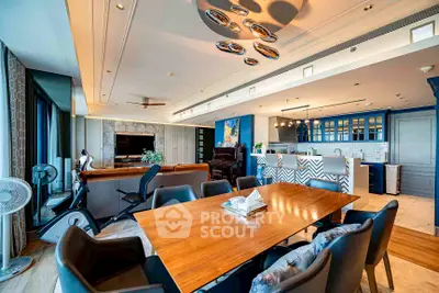 Luxurious open-plan living and dining area with modern kitchen and stylish decor