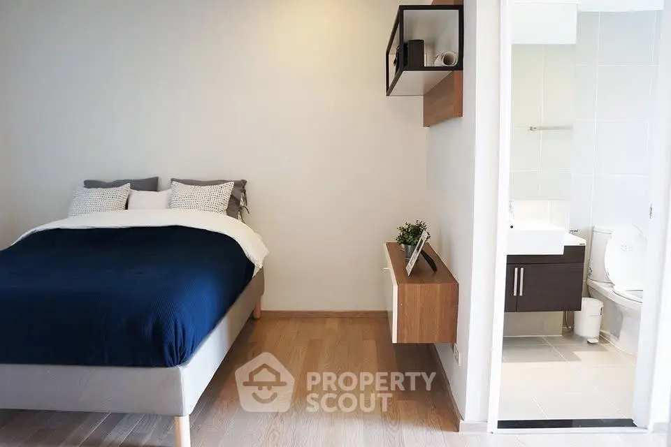 Modern bedroom with ensuite bathroom and stylish decor