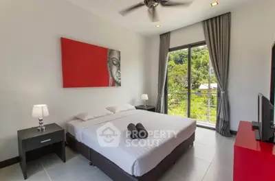 Modern bedroom with large window and scenic view, featuring stylish decor and comfortable furnishings.