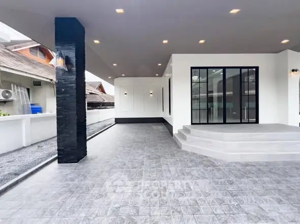 Modern exterior with sleek design and spacious patio area