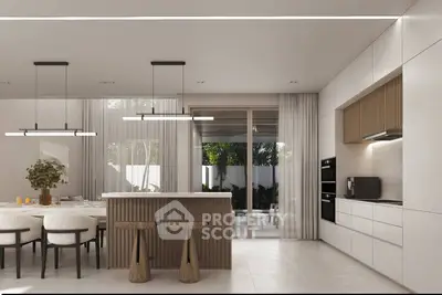 Modern open-layout kitchen with sleek design and dining area, featuring elegant lighting and natural light.