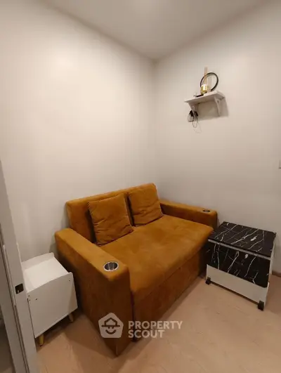 Cozy living room with a stylish brown sofa and modern decor