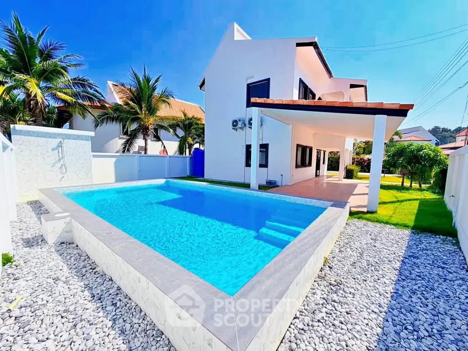 Stunning modern villa with private pool and lush garden, perfect for luxury living.