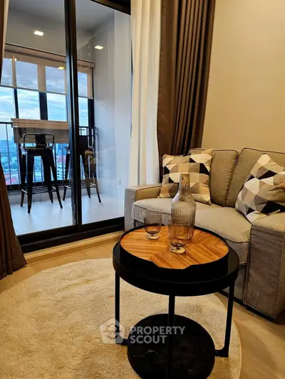 Modern living room with cozy sofa and balcony view