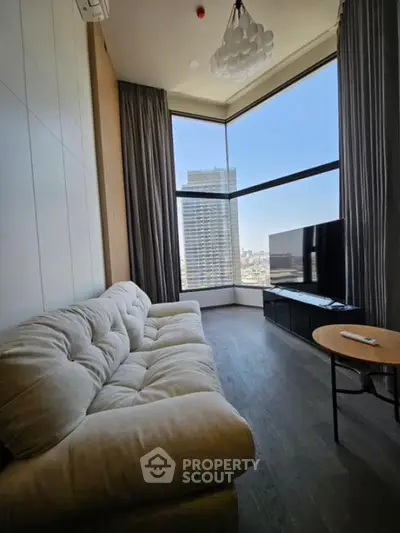 Luxurious living room with panoramic city view and modern furnishings