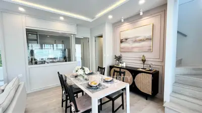 Elegant dining area with modern decor and open layout in a stylish home