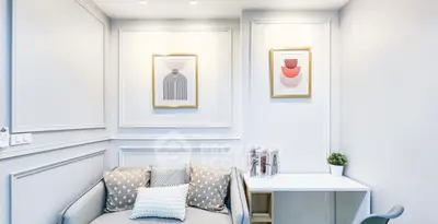 Chic modern living room with stylish decor and cozy seating area.
