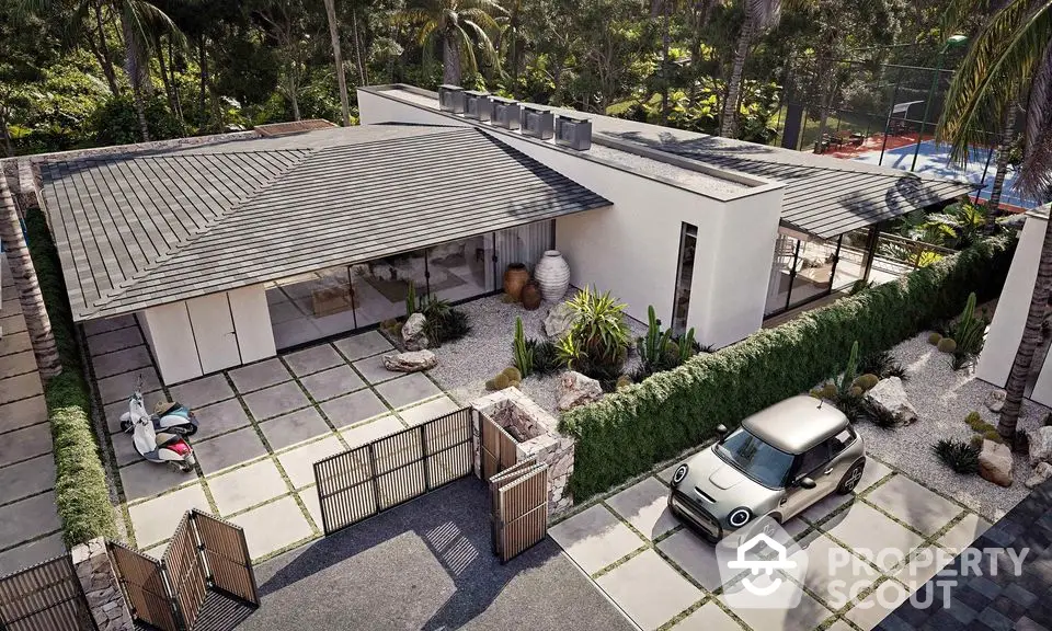 Modern luxury villa with sleek design, spacious driveway, and lush greenery in a serene setting.