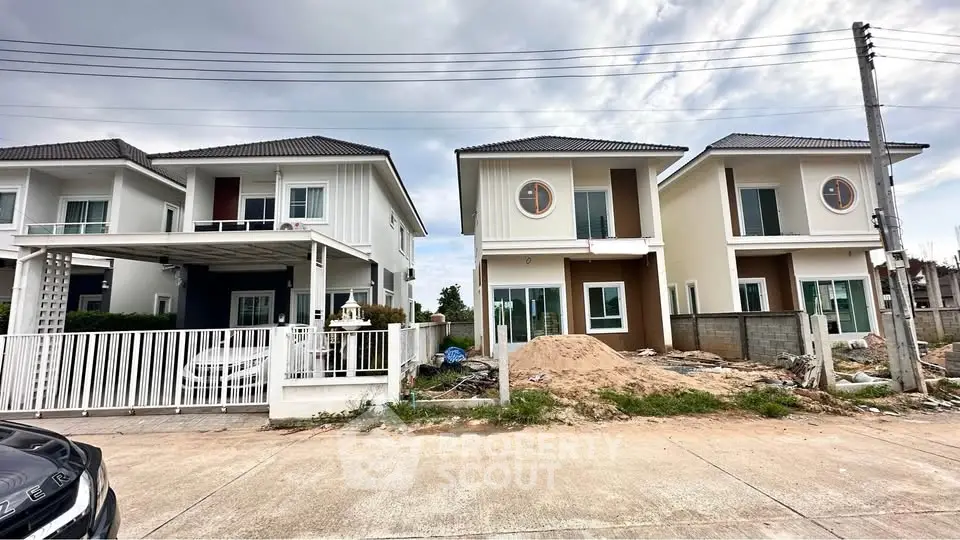 Modern two-story houses with contemporary design in a suburban neighborhood.