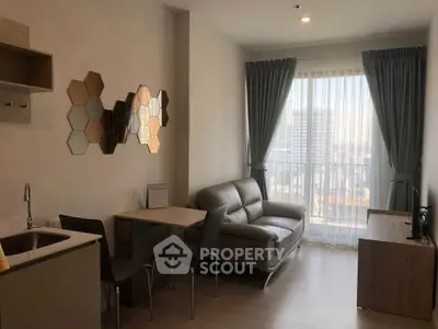 Modern living room with city view, stylish decor, and cozy seating area.