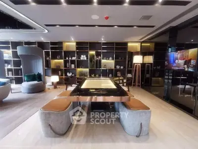 Luxurious modern living room with elegant furniture and stylish shelving unit.