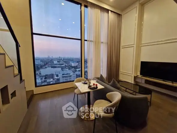 Luxurious living room with stunning city view and elegant decor