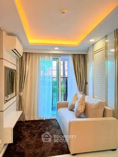 Modern living room with elegant lighting and cozy sofa near a window with curtains.