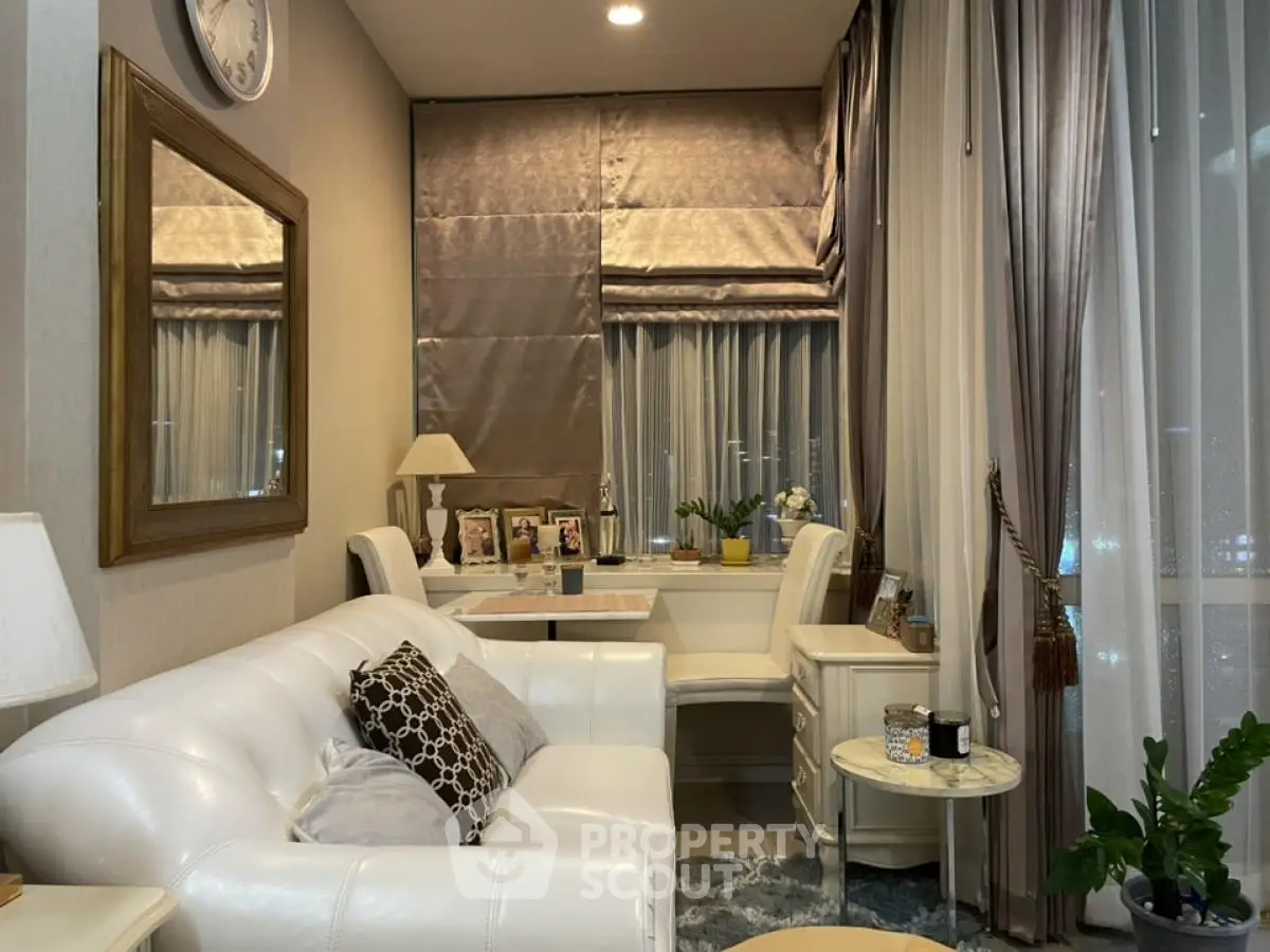 Elegant living room with white sofa and stylish decor in modern apartment