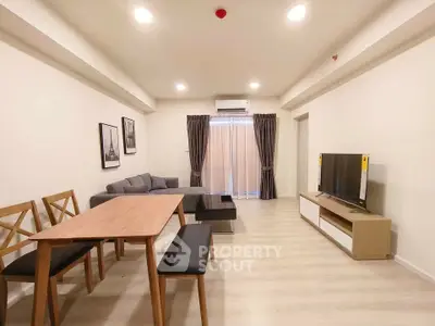 Modern living room with stylish furniture and natural light