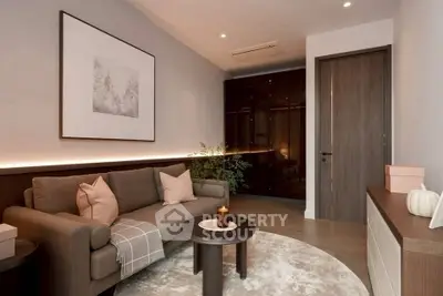 Stylish modern living room with cozy sofa, elegant decor, and ambient lighting for a warm atmosphere.