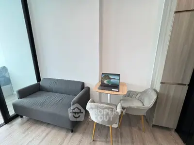 Modern compact living room with cozy sofa and stylish dining set
