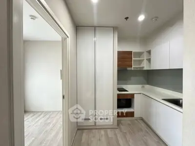 Modern kitchen with sleek cabinetry and open layout design